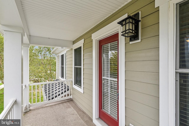 balcony featuring a porch