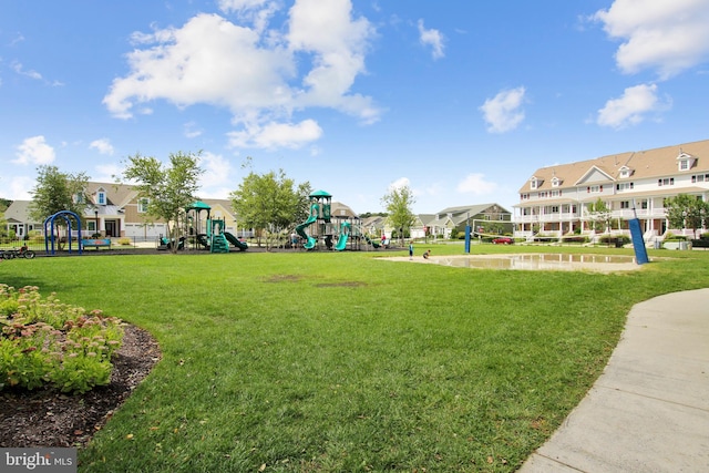 surrounding community with a playground and a lawn