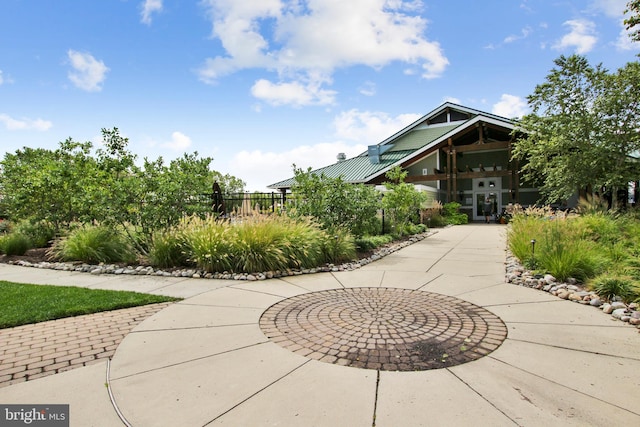 view of property's community featuring a patio area