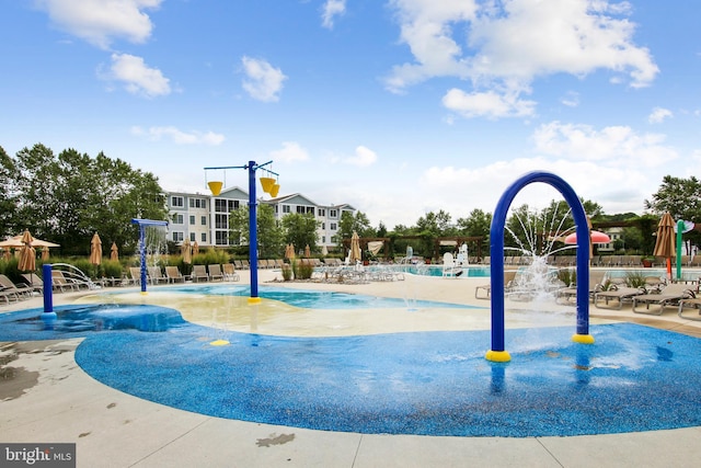 view of property's community with a pool