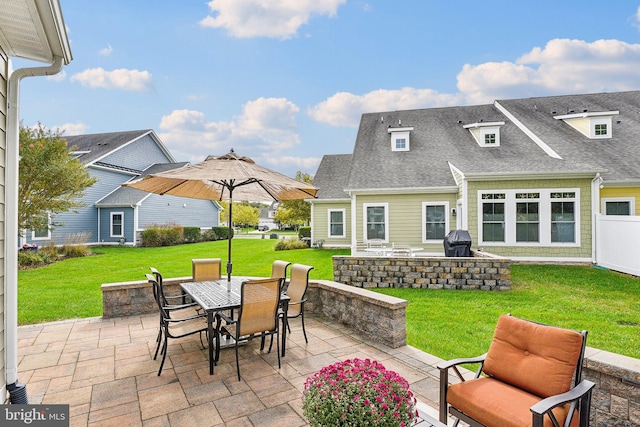 view of patio with a grill