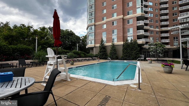 view of pool with a patio