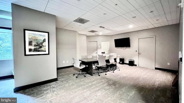 home office with wood-type flooring