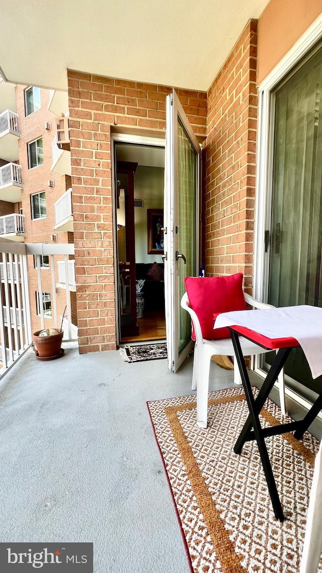 interior space with a balcony