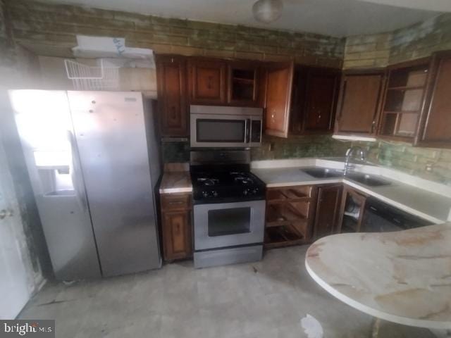 kitchen with sink and stainless steel appliances