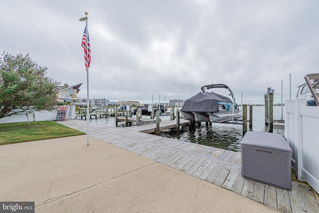 view of dock with a water view