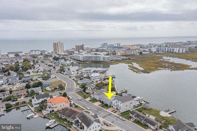 drone / aerial view with a water view