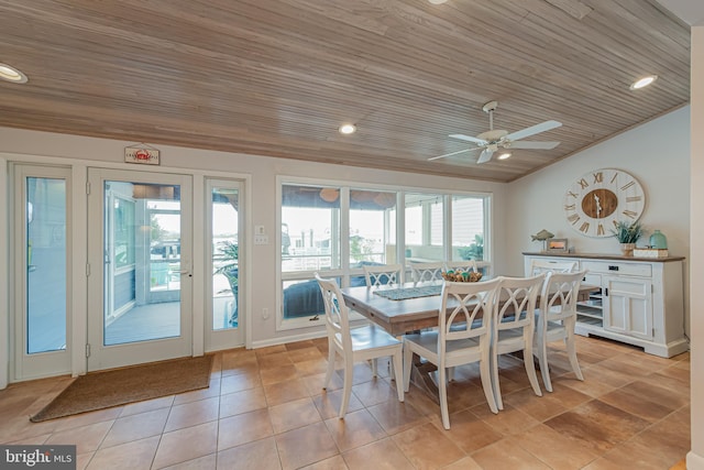 tiled dining area featuring ceiling fan, plenty of natural light, and wooden ceiling