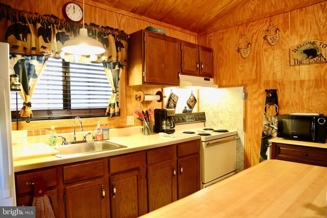 kitchen featuring lofted ceiling, wood walls, sink, white electric range, and wooden ceiling