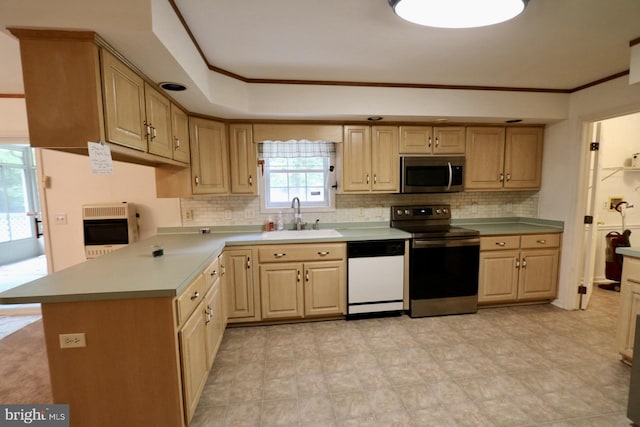 kitchen featuring heating unit, sink, stainless steel appliances, backsplash, and light brown cabinetry