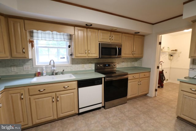 kitchen featuring backsplash, white dishwasher, light brown cabinetry, sink, and electric range