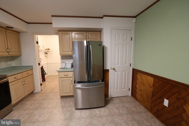 kitchen featuring stainless steel fridge, backsplash, wood walls, and crown molding