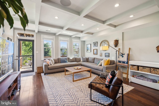 living room with coffered ceiling, dark hardwood / wood-style floors, and beam ceiling