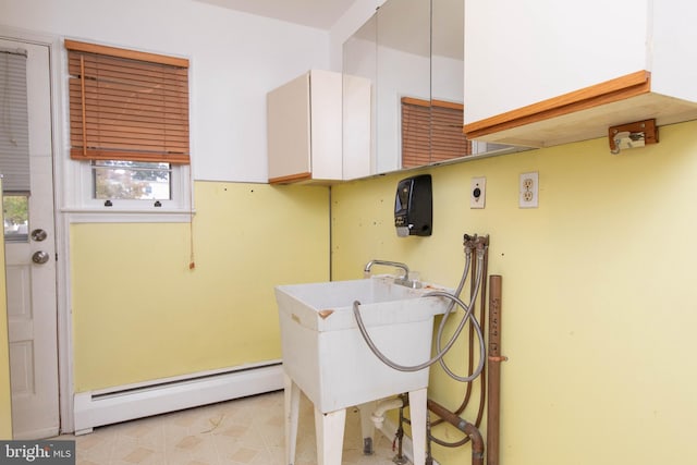 laundry area featuring hookup for a washing machine and baseboard heating