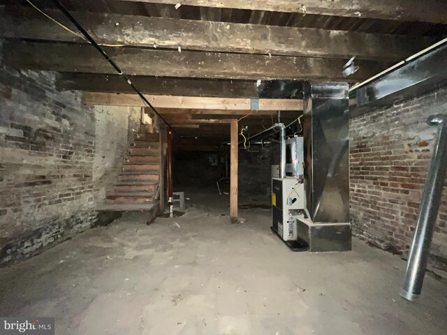 basement featuring heating unit