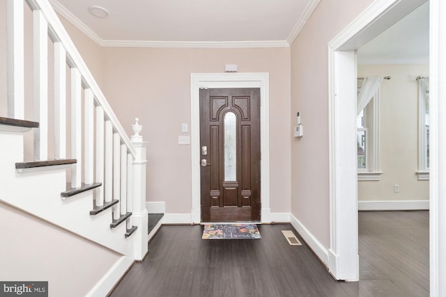 entrance foyer featuring ornamental molding and dark wood-type flooring