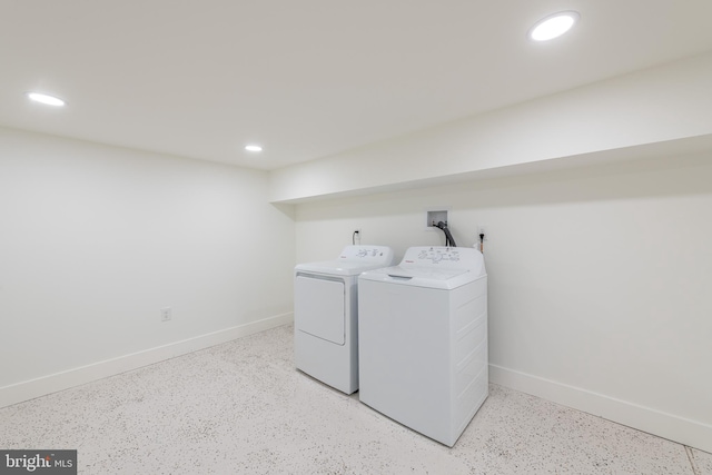 laundry room featuring washer and clothes dryer