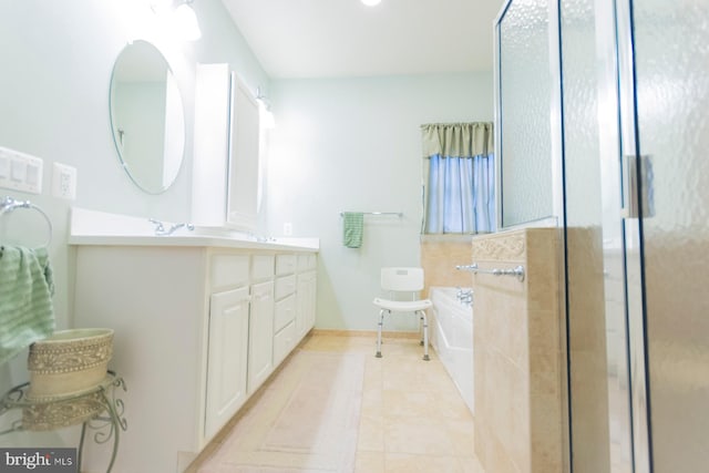 bathroom featuring vanity, plus walk in shower, and tile patterned flooring