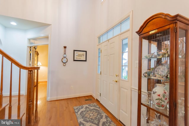 entryway with light hardwood / wood-style floors