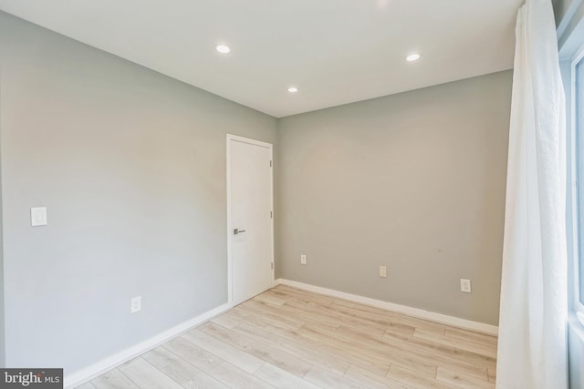 empty room with light wood-type flooring