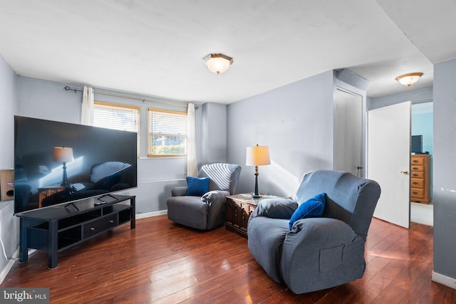 living room featuring dark hardwood / wood-style floors