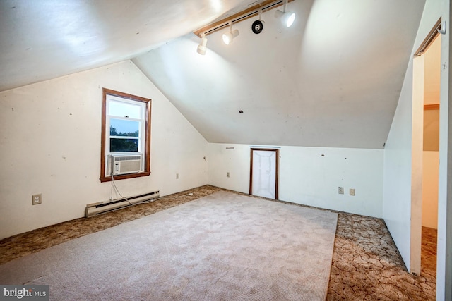 bonus room with cooling unit, vaulted ceiling, light colored carpet, and a baseboard radiator