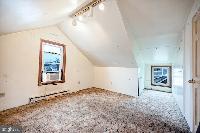 bonus room with lofted ceiling, carpet flooring, and baseboard heating