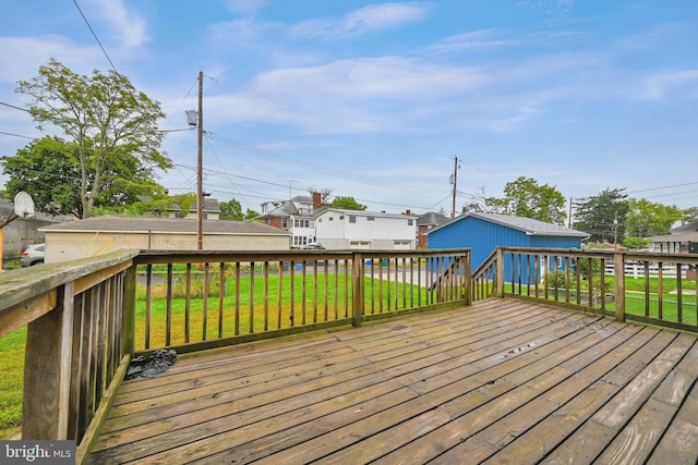 wooden deck with a yard