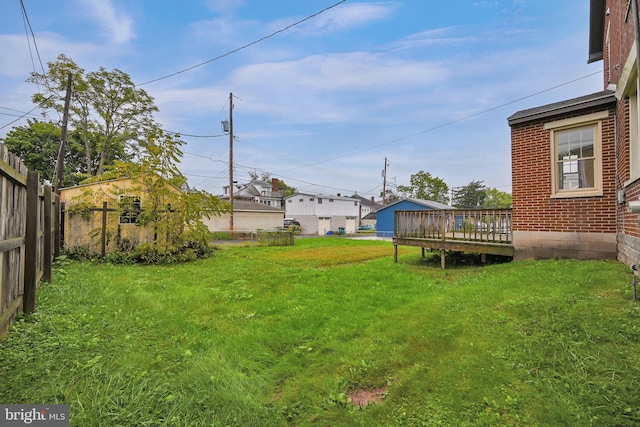 view of yard featuring a wooden deck