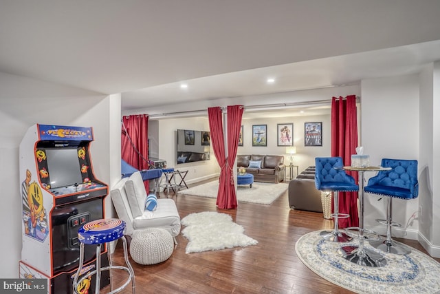 recreation room featuring hardwood / wood-style flooring