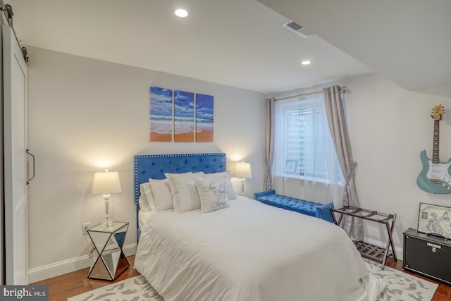 bedroom featuring hardwood / wood-style flooring