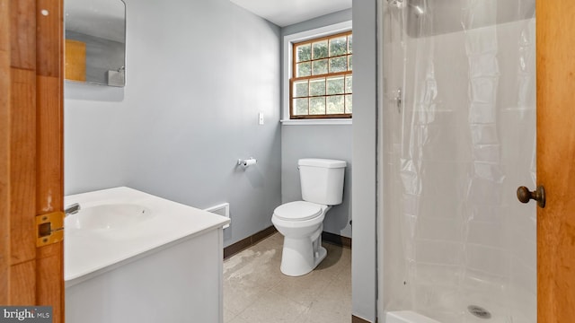 bathroom with vanity, toilet, and a shower with curtain