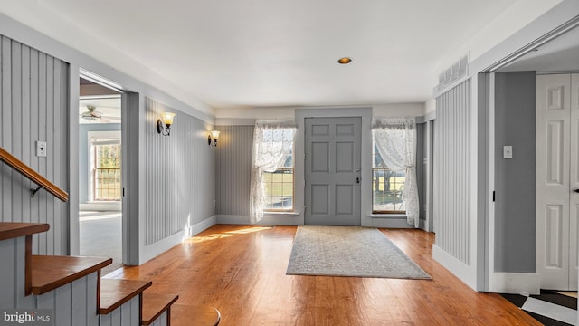 foyer with light hardwood / wood-style floors