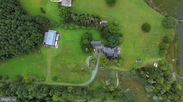 birds eye view of property featuring a rural view