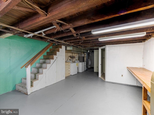 basement featuring separate washer and dryer