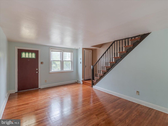 entryway with light hardwood / wood-style flooring