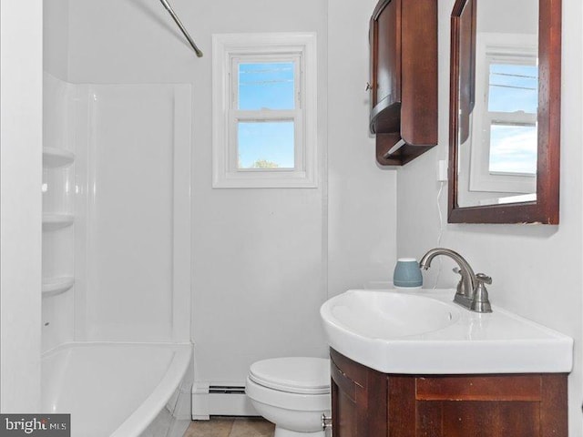 full bathroom featuring a baseboard heating unit, washtub / shower combination, vanity, and toilet