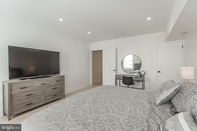 bedroom featuring light hardwood / wood-style floors