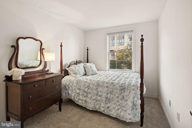 bedroom with light carpet