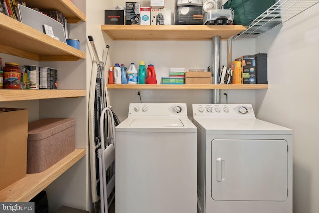 washroom featuring independent washer and dryer