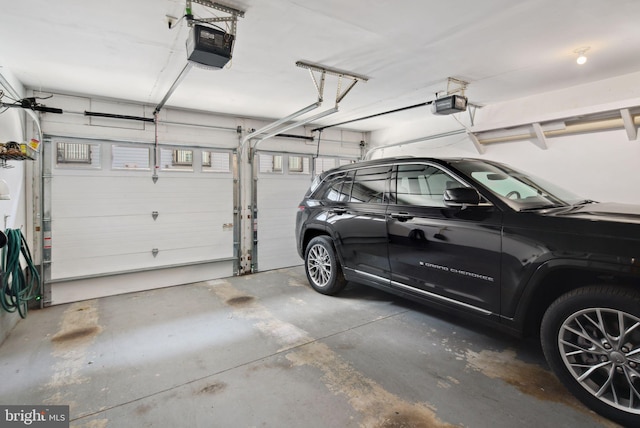 garage featuring a garage door opener