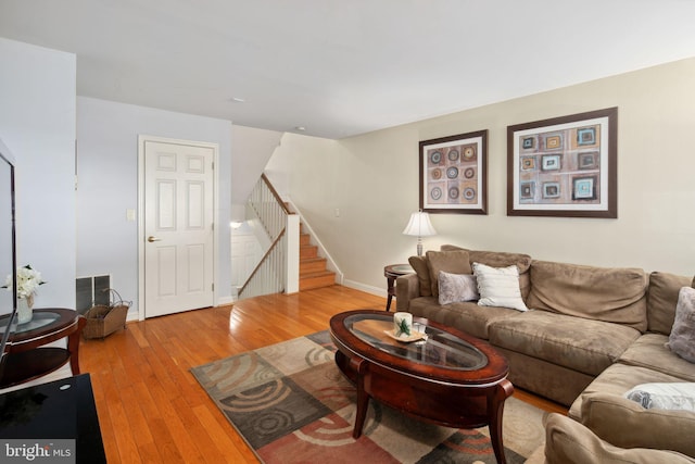 living room with light hardwood / wood-style flooring