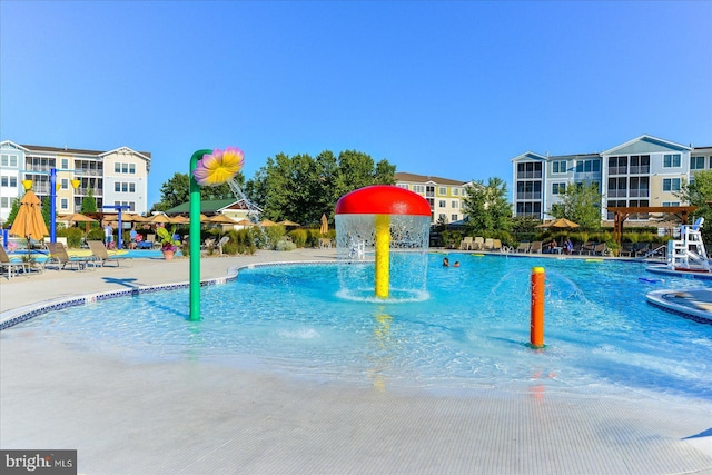 view of pool featuring pool water feature