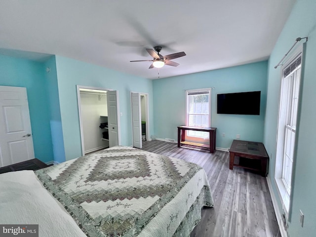 bedroom featuring wood-type flooring and ceiling fan