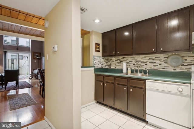 kitchen featuring dark brown cabinetry, white dishwasher, wood ceiling, sink, and light hardwood / wood-style flooring