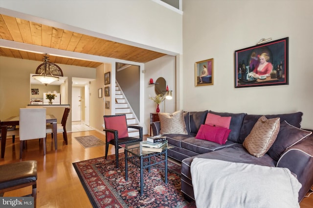 living room with wood-type flooring and wood ceiling