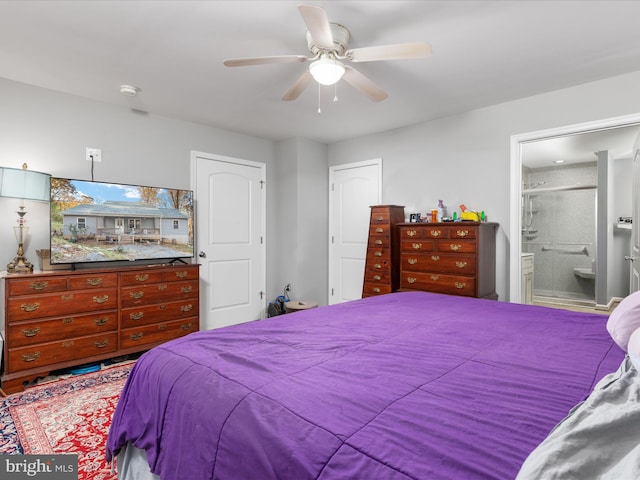 bedroom with ensuite bathroom and ceiling fan