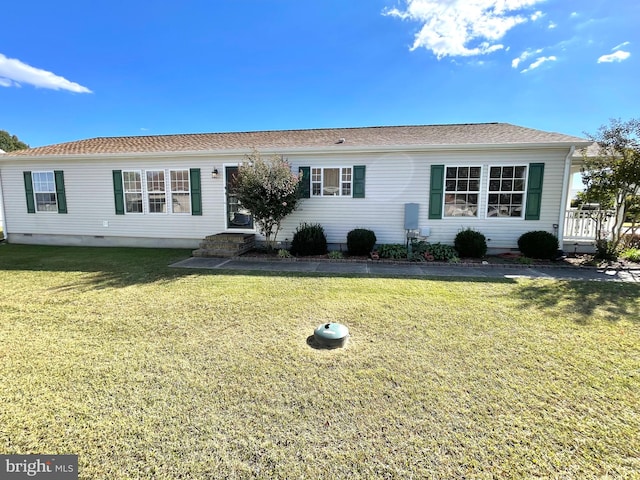 view of front of house with a front lawn