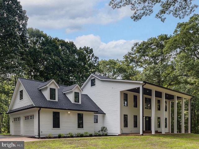 view of front of home with a front lawn and covered porch