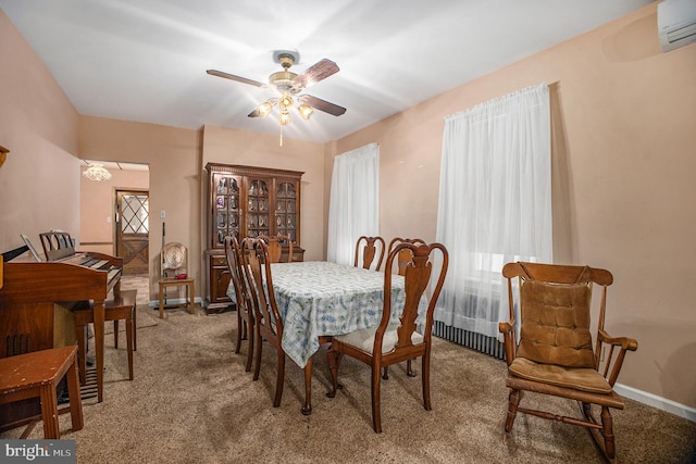 carpeted dining room with a wall mounted AC and ceiling fan